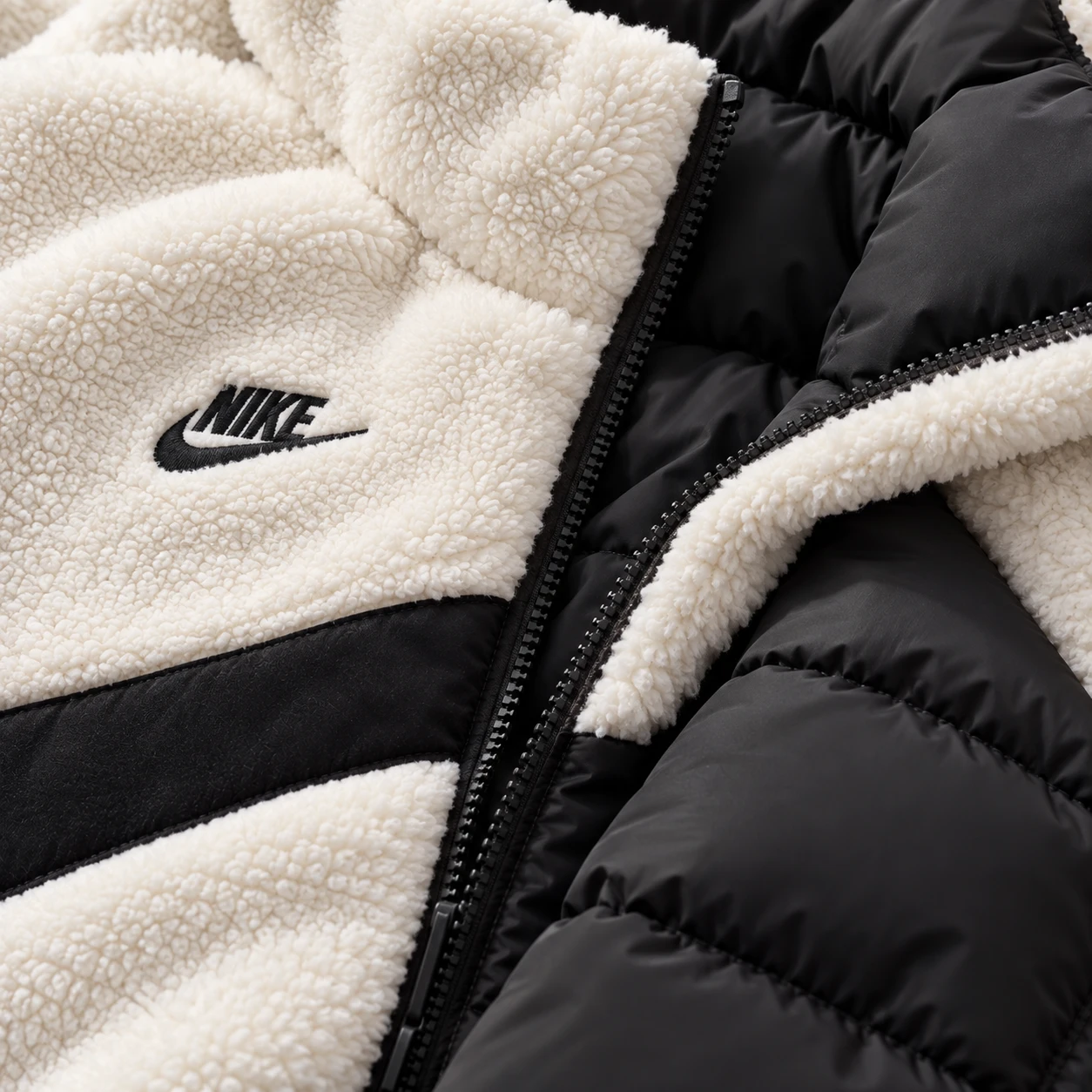 Piumino reversibile in sherpa